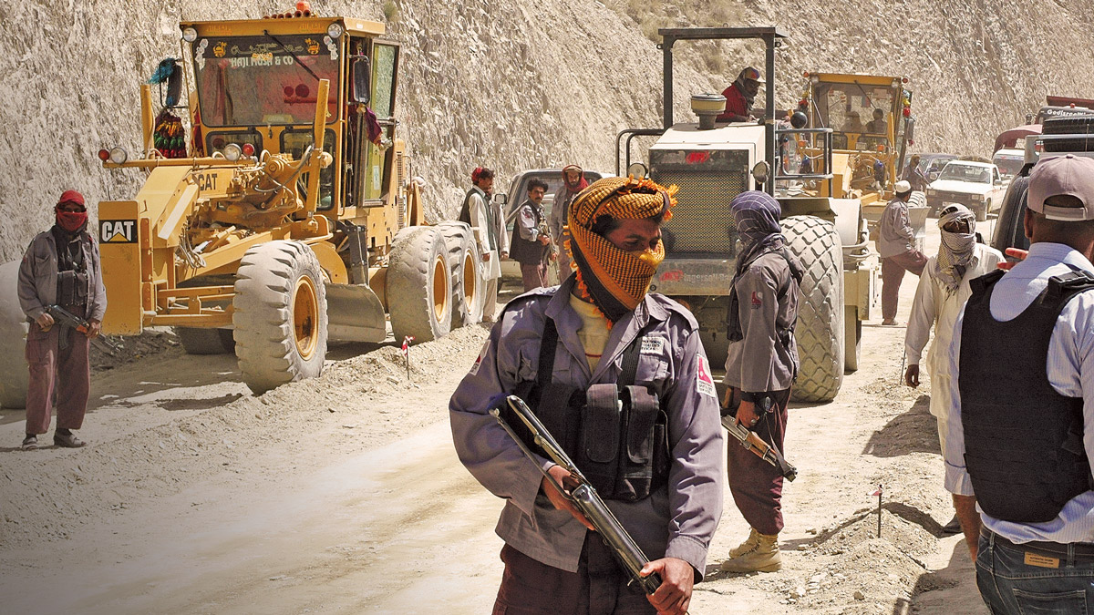 Private security contractors protect the construction of the Khost-Gardez road, on March 30, 2010. (USAID photo)